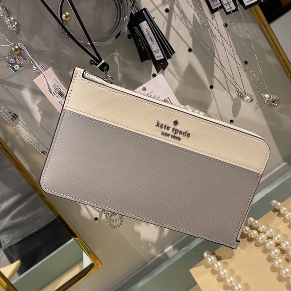 Kate Spade Lucy Medium L-Zip Wristlet 
COLOR: Platinum Grey Multi 
NWT - Picture 10 of 16